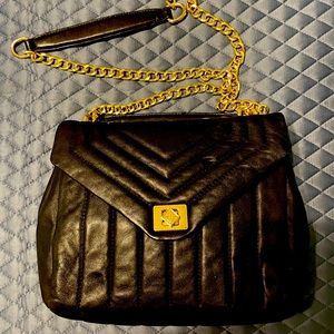 Beautiful Antonio Melani black leather handbag. Barely used/perfect condition.